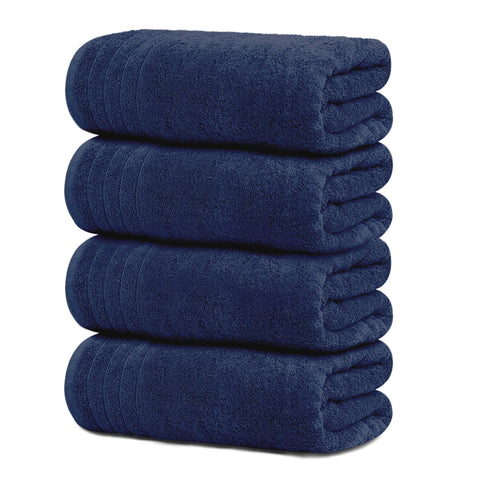 Tens Towels four-pack navy towels ready for bath use.