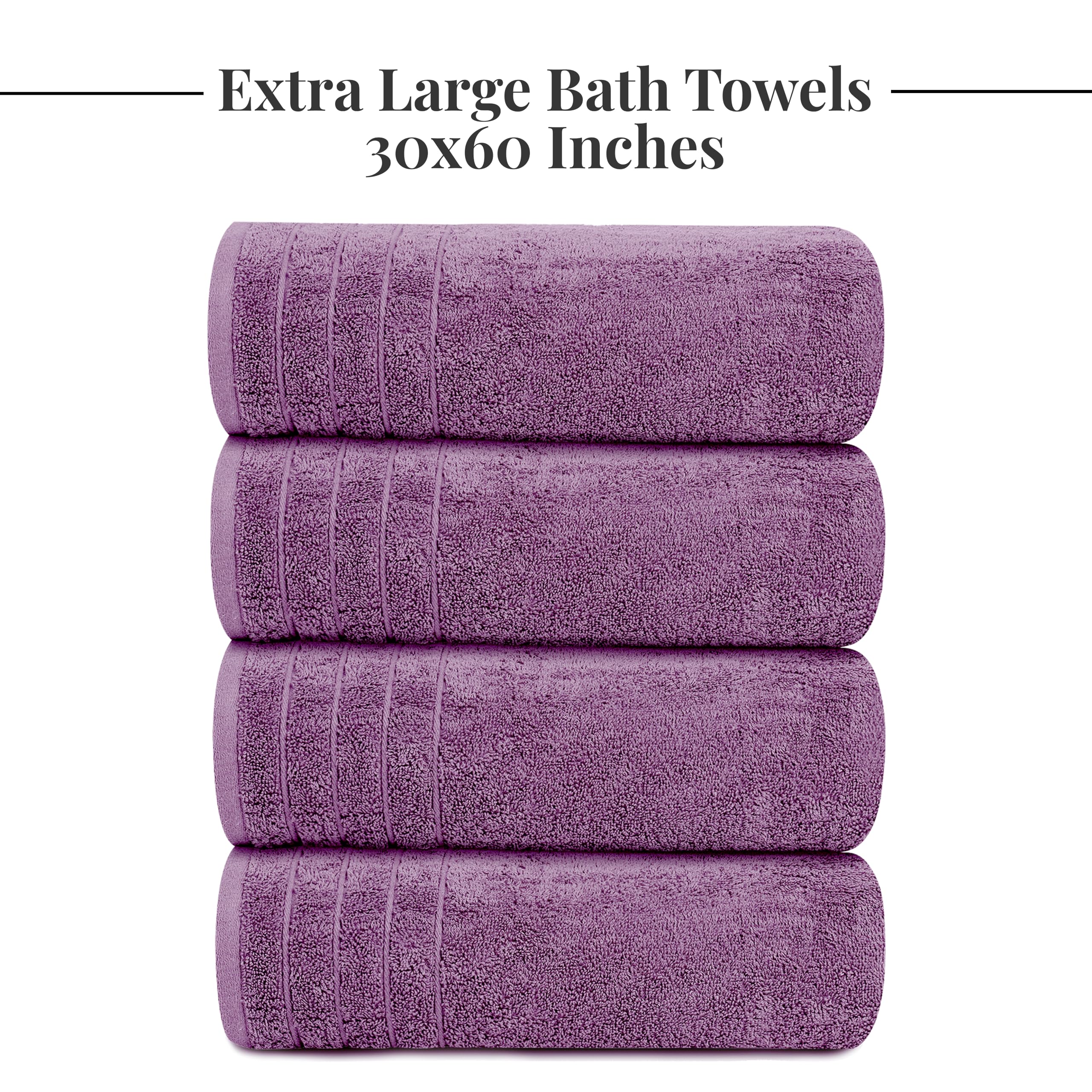 Tens Towels purple bathroom scene showing four oversized towels ready.