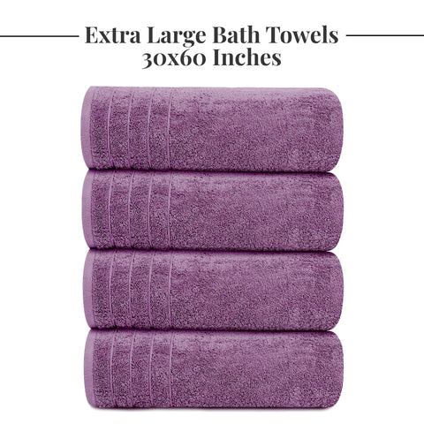 Tens Towels purple bathroom scene showing four oversized towels ready.