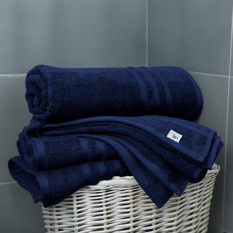Lightweight quick-dry Tens Towels navy bath towels in use after shower