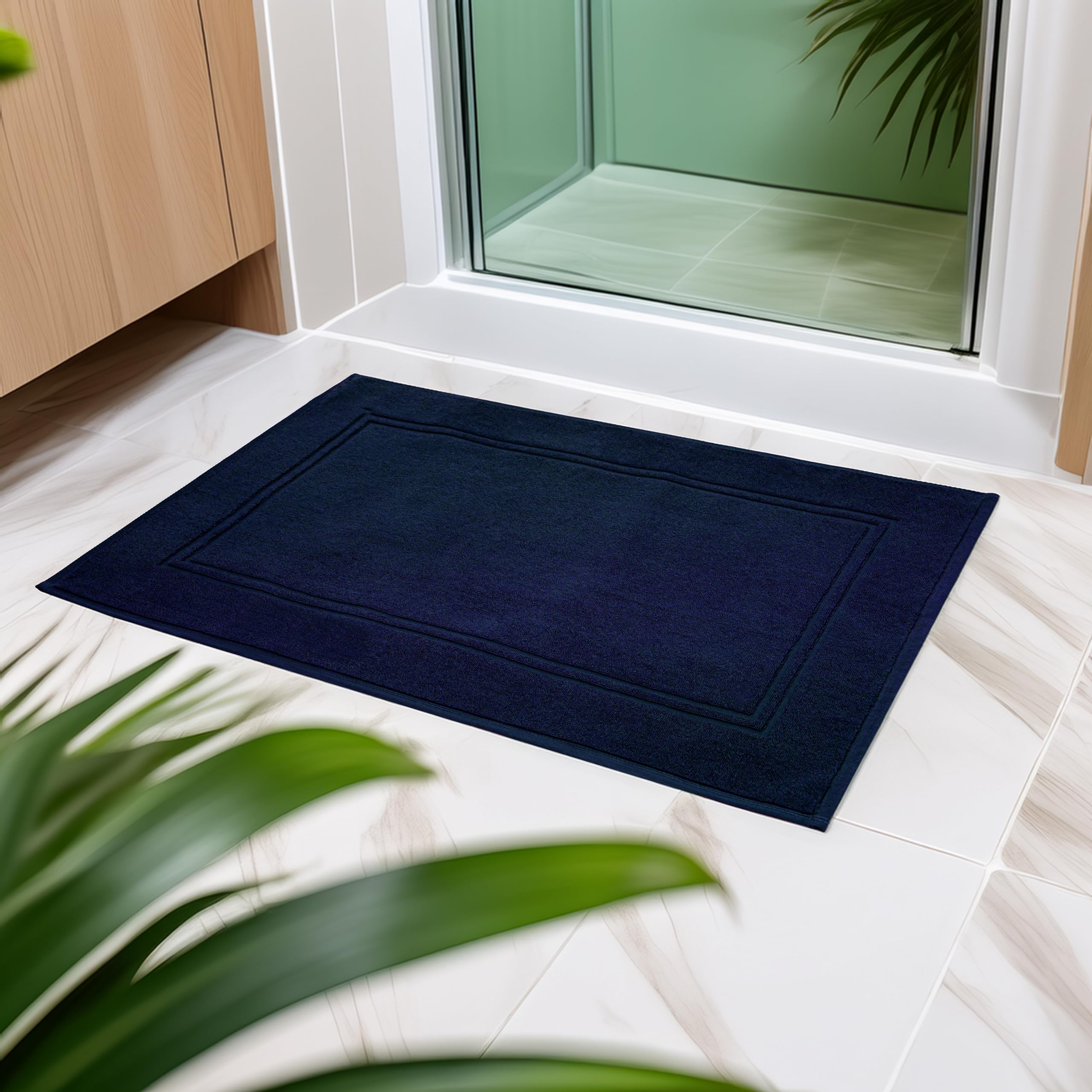 Tens Towels super-absorbent bath mats help keep floors dry after showers.