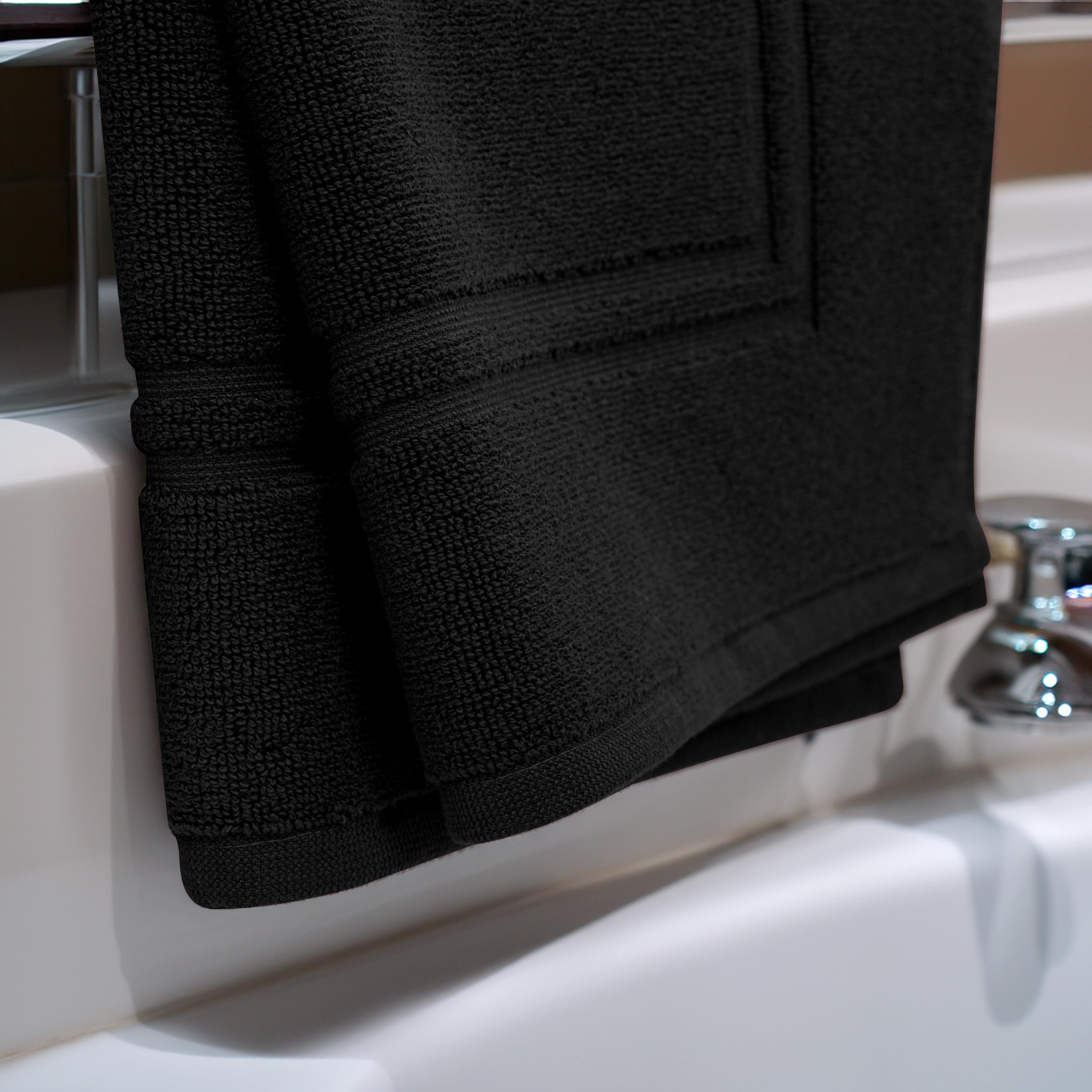 Super absorbent Tens Towels mat helps keep floors dry