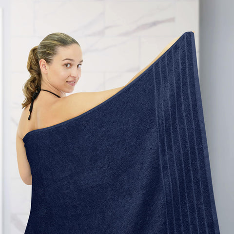 Tens Towels navy bath sheet draped for spa-like wrap