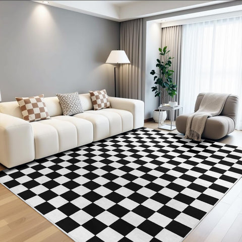 Terrug checkered rug in bedroom adds timeless contrast and charm.