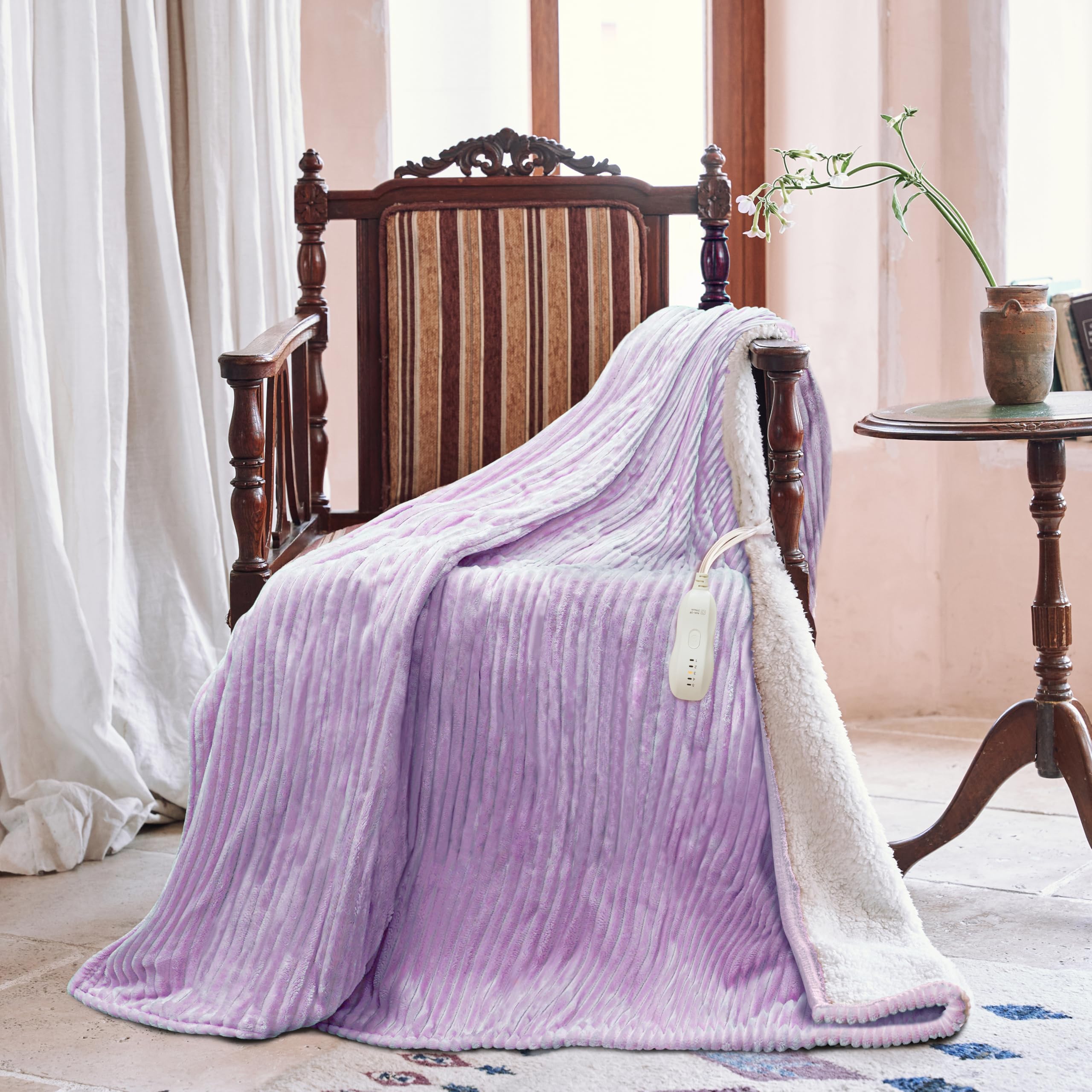 Texciting blanket with digital controller offers five heat settings for comfort.