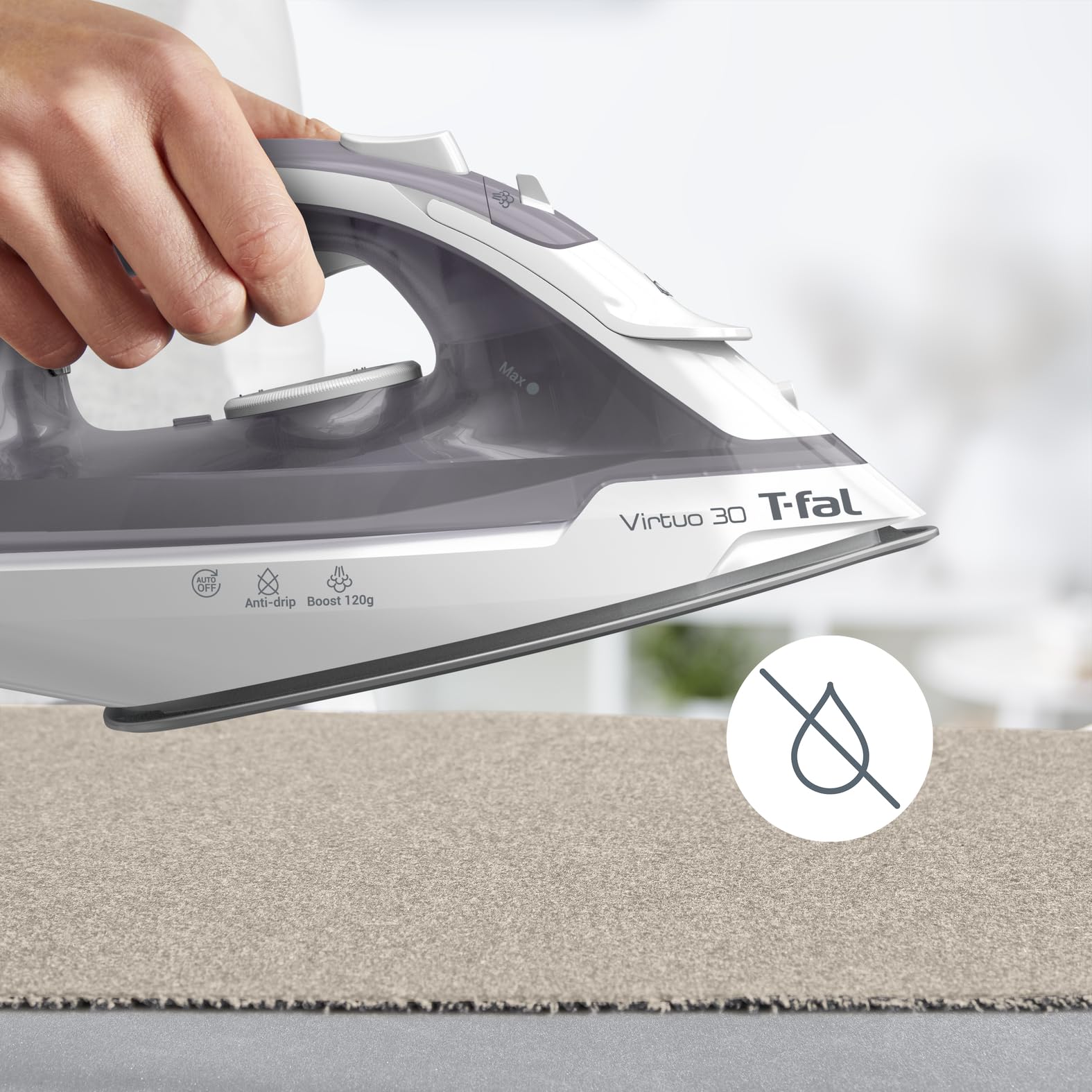 T-Fal Virtuo Steam Iron ceramic soleplate glide across fabrics.