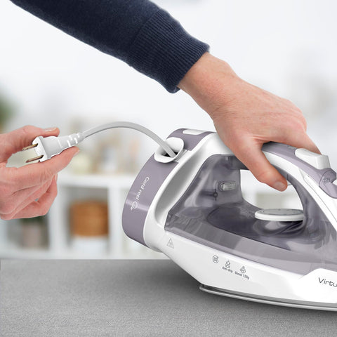 T-Fal Virtuo Steam Iron vertical steaming demonstrates versatility for hanging garments.