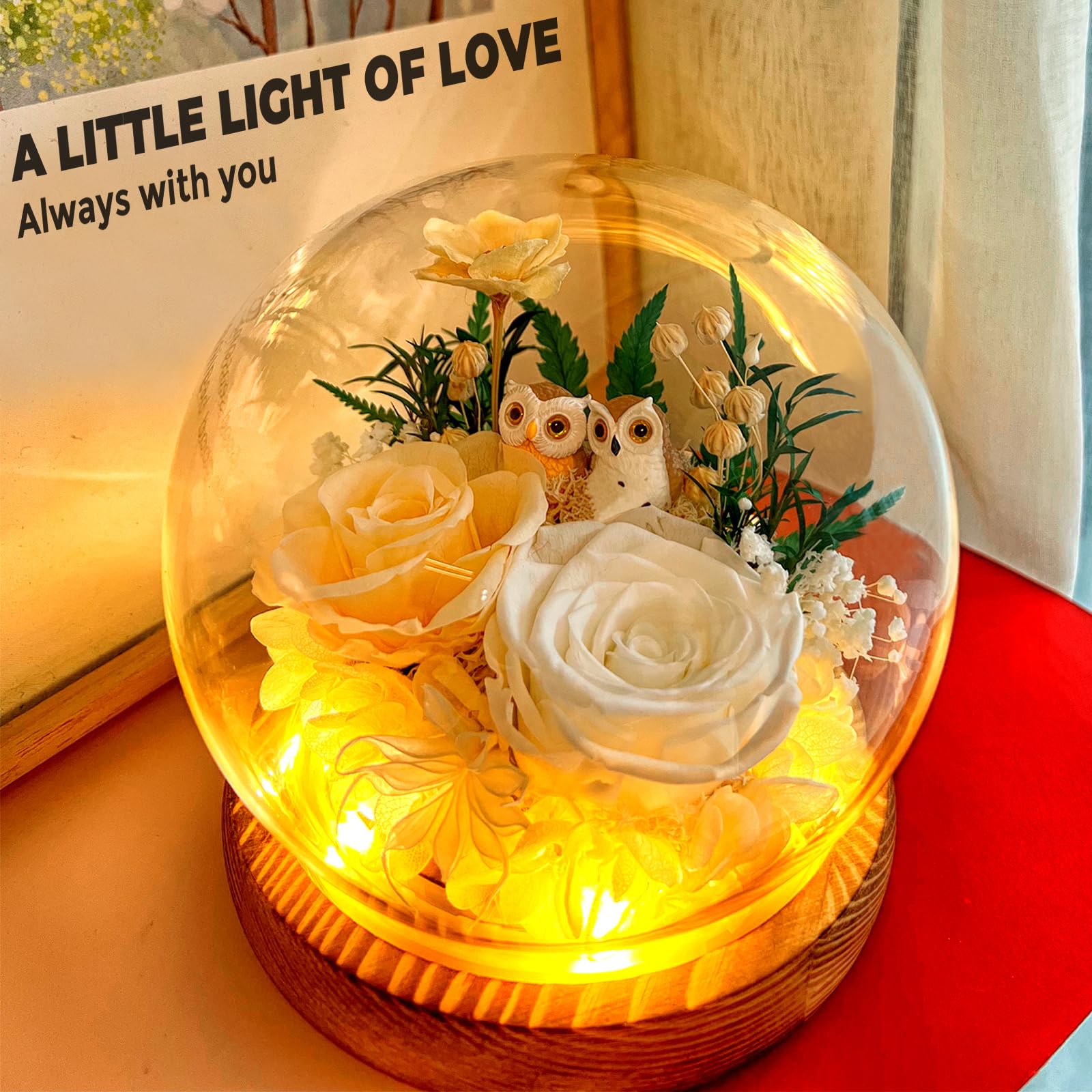 TGELATA LED-lit roses on a wooden base glow softly.