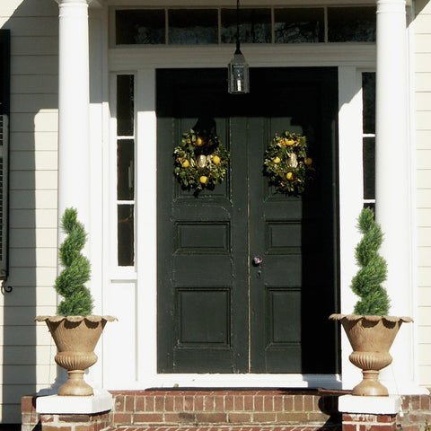 The Bloom Times front porch topiary set demonstrates versatile placement for entrances