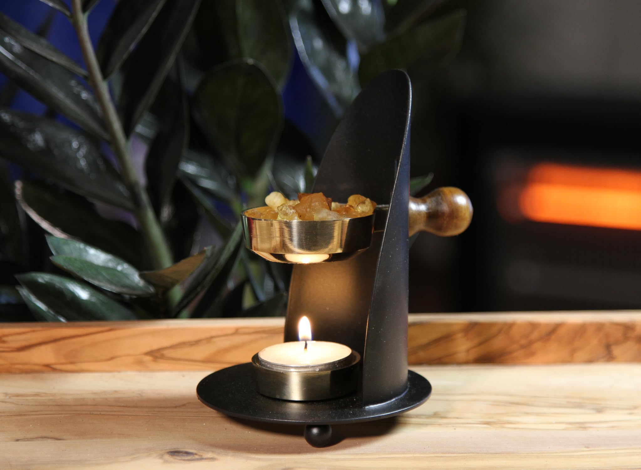 THE JERUSALEM GIFT SHOP brass resin burner showcases heat-safe charcoal use for resin incense.
