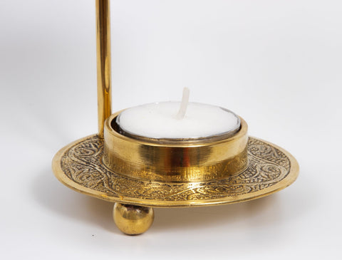 Versatile incense holder adapts to candles or charcoal for varied rituals.