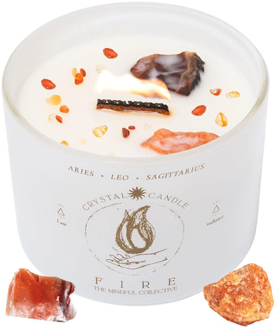 The Mindful Collective Aries-Leo-Sag crystal candle with a wood wick energizes your space.