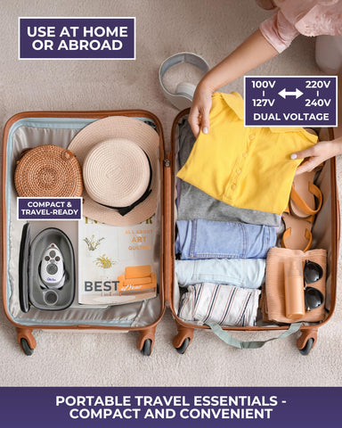 Pink travel-case-ready iron resting on included accessory for convenience.