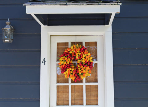Silk tulips on The Wreath Depot wreath designed for sheltered outdoor use.