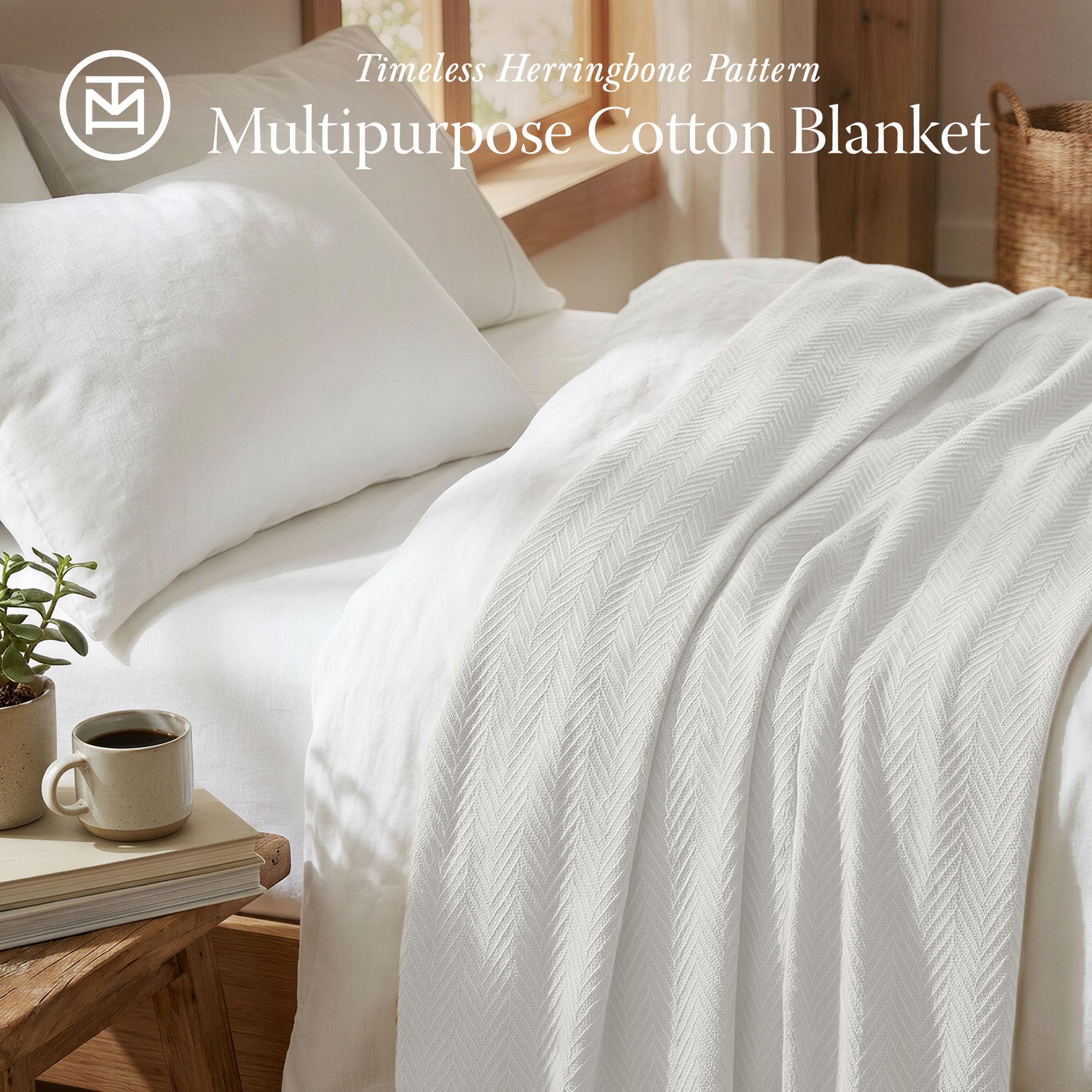 Threadmill herringbone cotton texture blanket prominently displays smooth, inviting warmth.