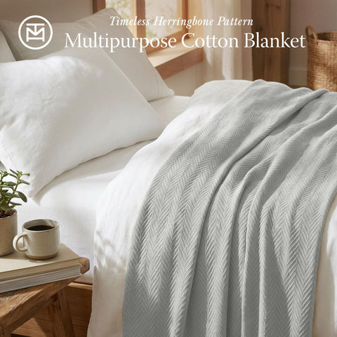Threadmill cotton blanket on a California king bed for all-season comfort.