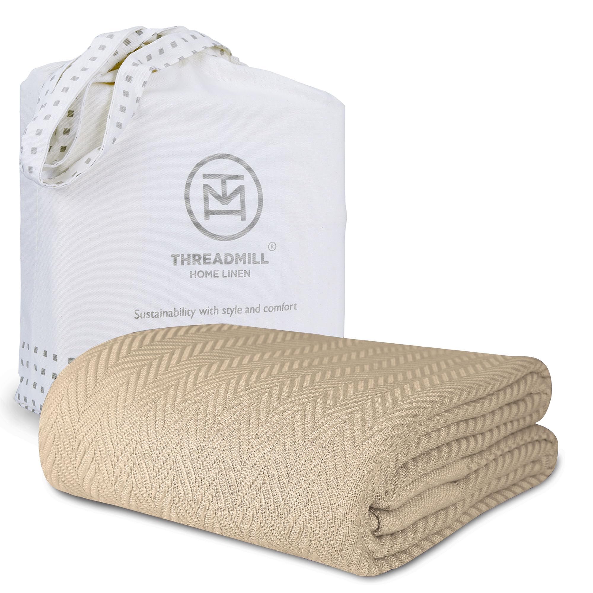 Threadmill luxury cotton blanket on king bed offers all-season warmth.