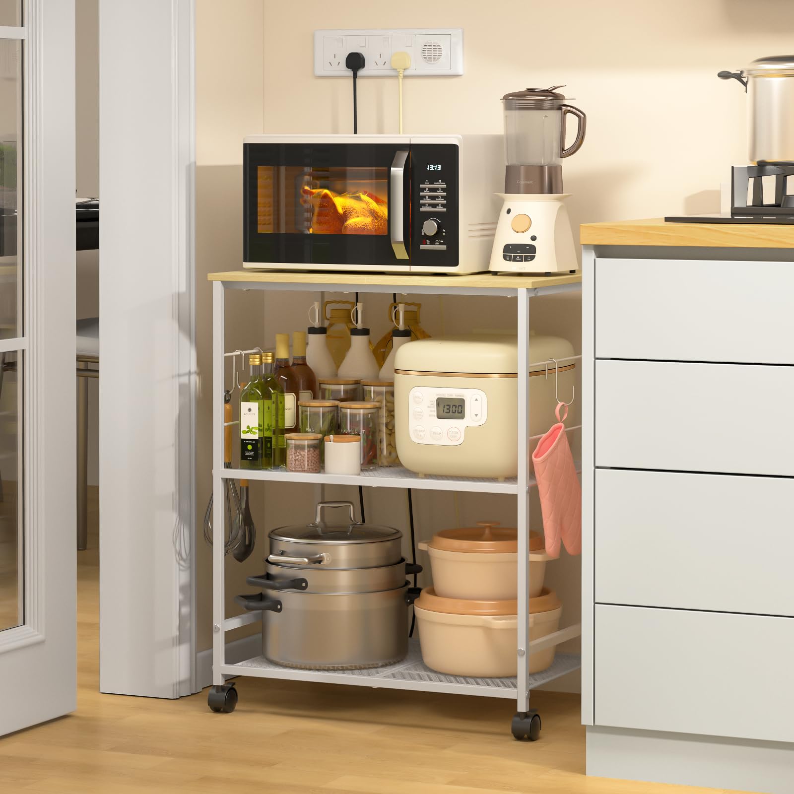 ThreeHio microwave cart with lockable wheels keeps the station steady during use.
