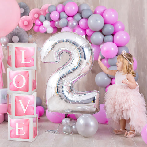 Thyle baby shower backdrop idea creates memorable photo moments.