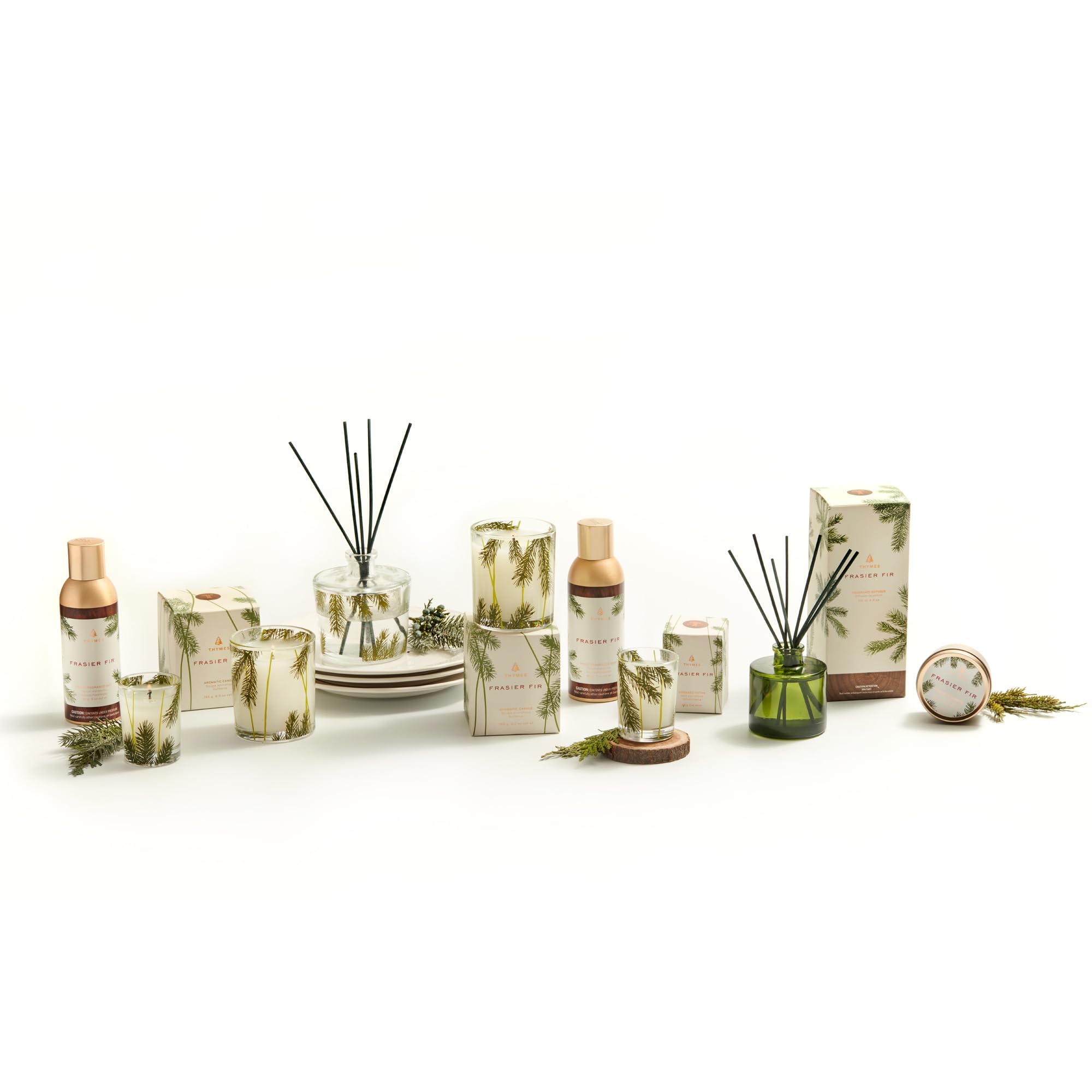 Thymes Frasier Fir 3oz bottle showcases compact, travel-friendly fragrance.