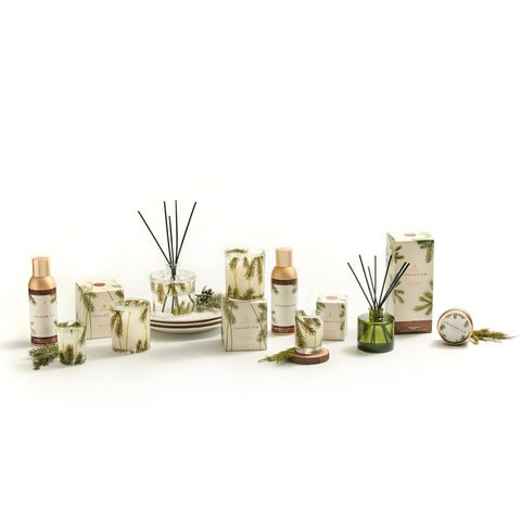 Thymes Frasier Fir 3oz bottle showcases compact, travel-friendly fragrance.