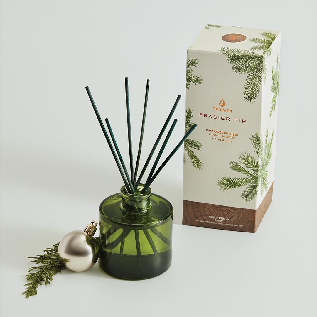Close-up of Thymes Frasier Fir fragrance oil showing crisp fir and cedarwood notes