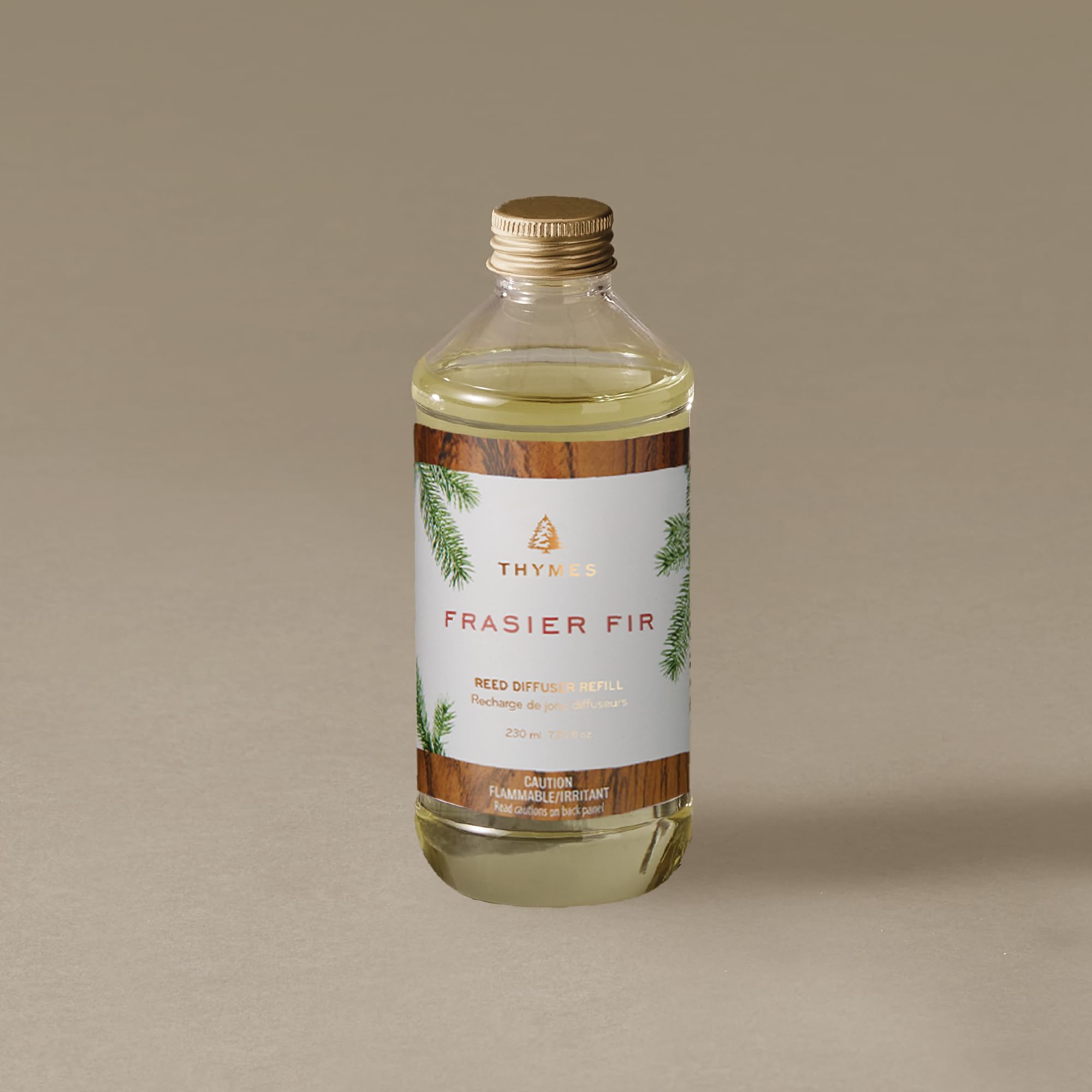 Thymes Frasier Fir scent diffuser oil delivers crisp fir notes.