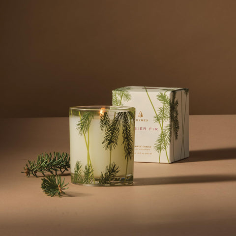 Thymes Frasier Fir close-up of pine needle design on candle.