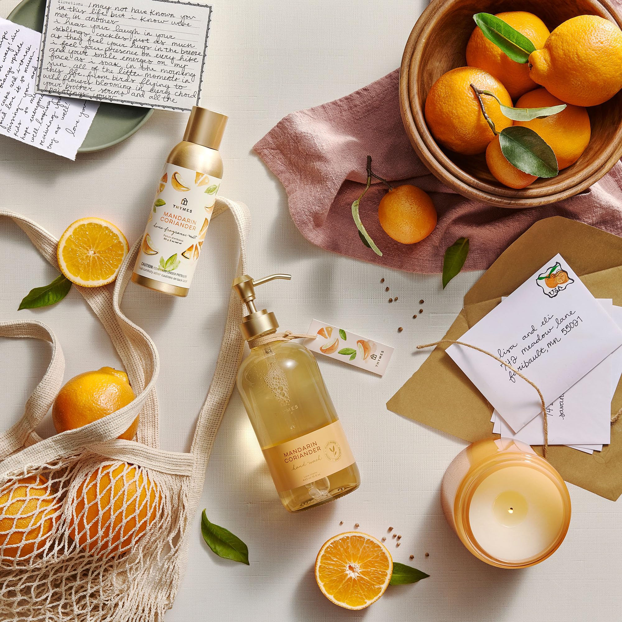 Thymes Mandarin Coriander mist closeup label signals premium, long-lasting aroma.