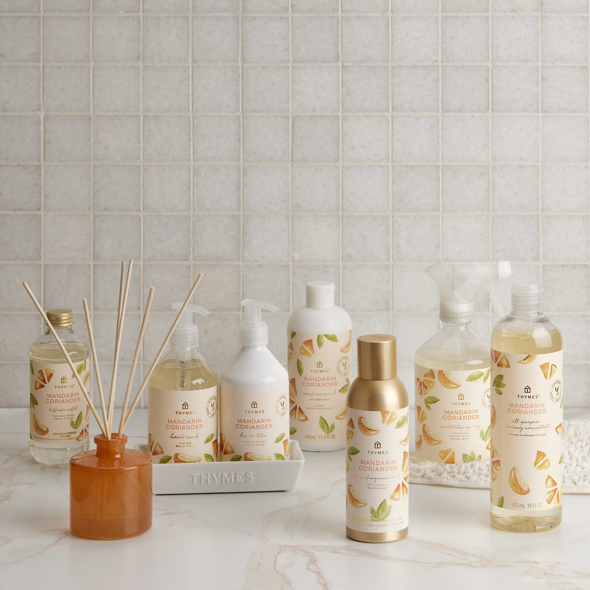 Thymes Mandarin Coriander mist dining room scene conveys citrus-herbal aroma.