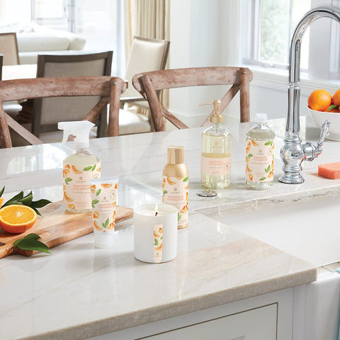 Thymes Mandarin Coriander mist set on table creates inviting ambiance.