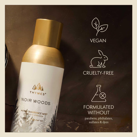 Noir Woods mist spritz in living room creates warm, inviting atmosphere.