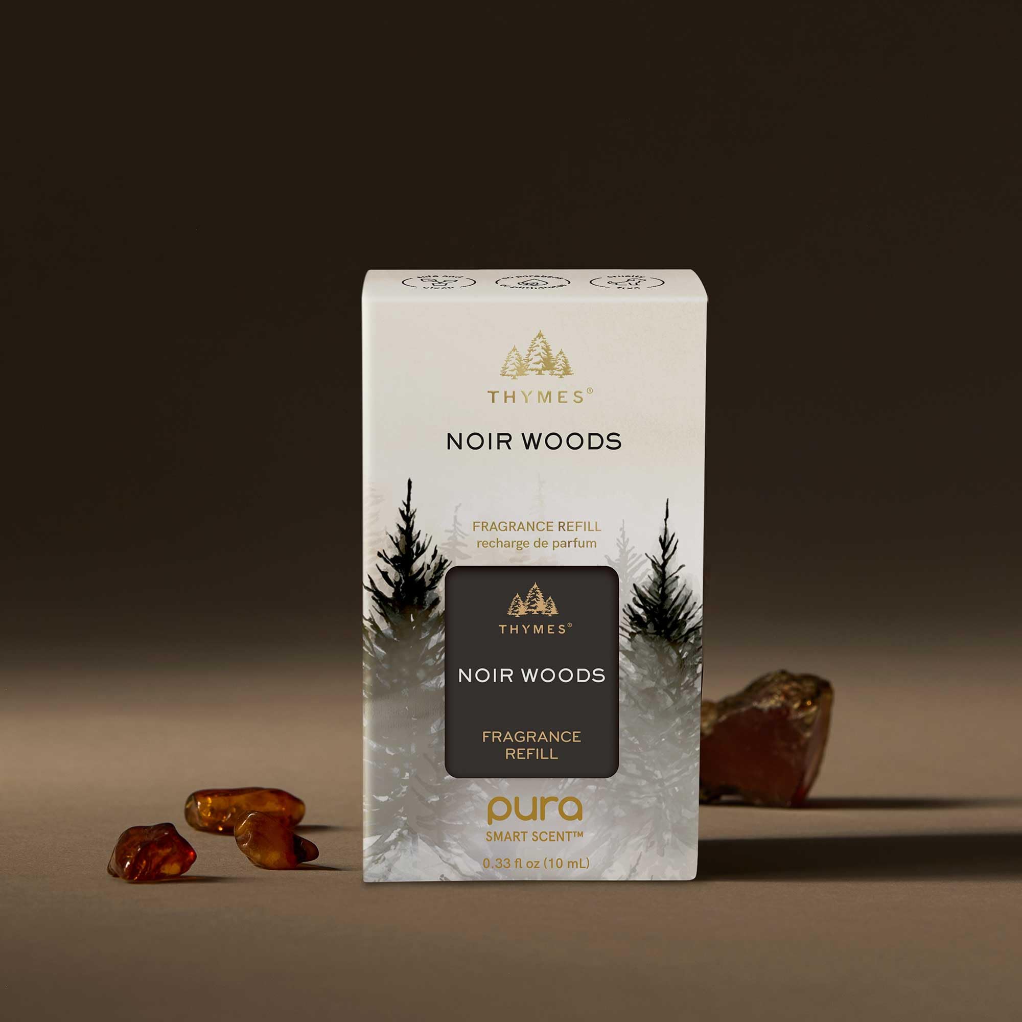 Thymes Pura Noir Woods refill angle view emphasizes smoky-wood aroma for sophisticated spaces.