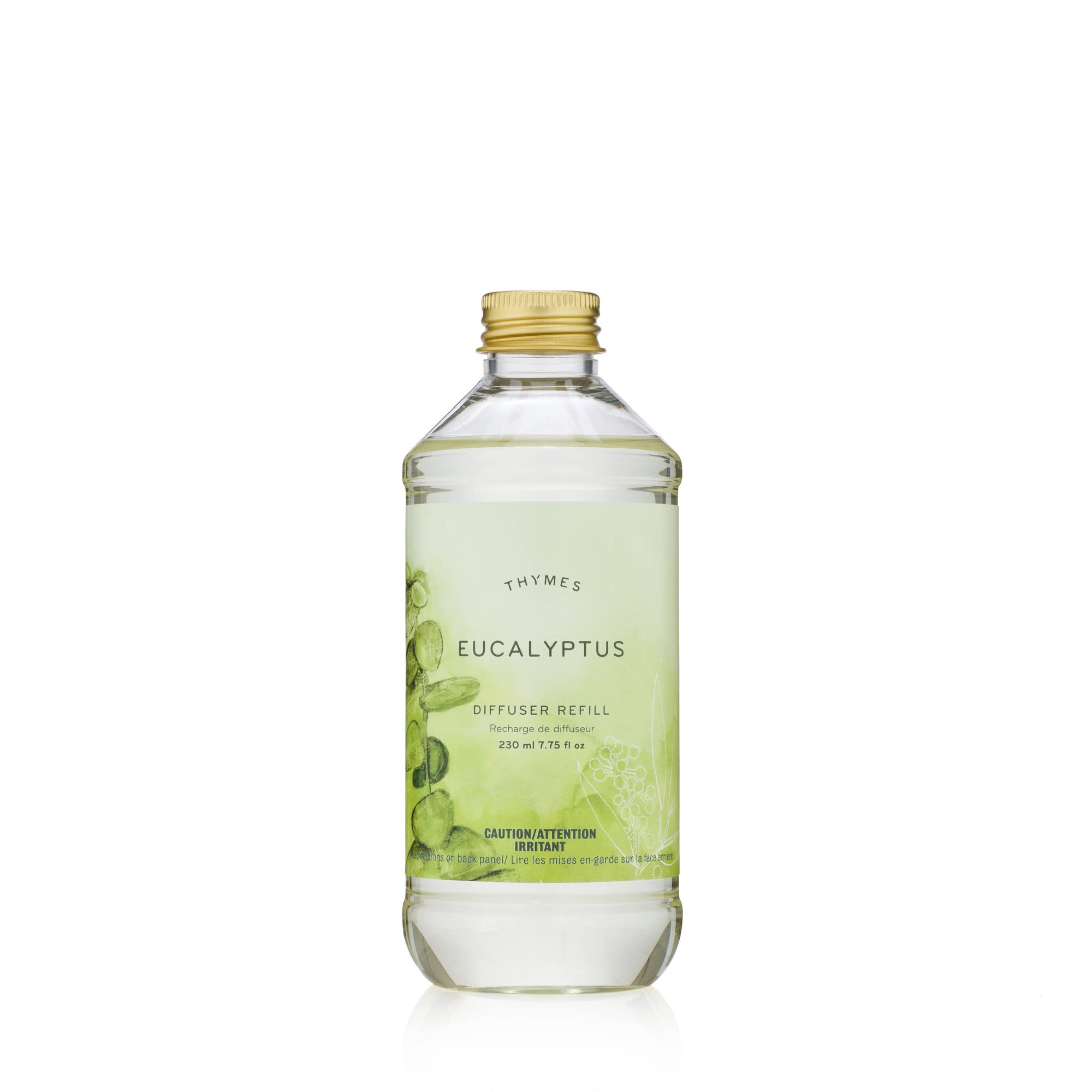Thymes reed diffuser oil refill bottle close-up highlighting eucalyptus and citrus fragrance.