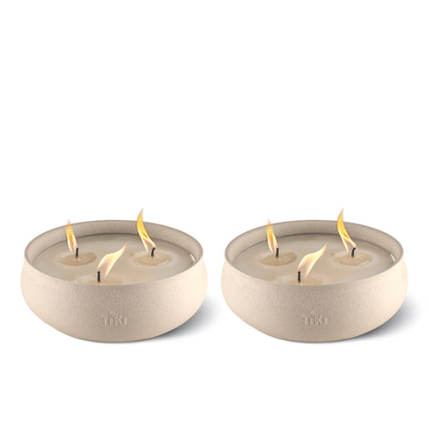 TIKI citronella candle 2-pack with white bowl elevates outdoor tables and creates warm ambience.