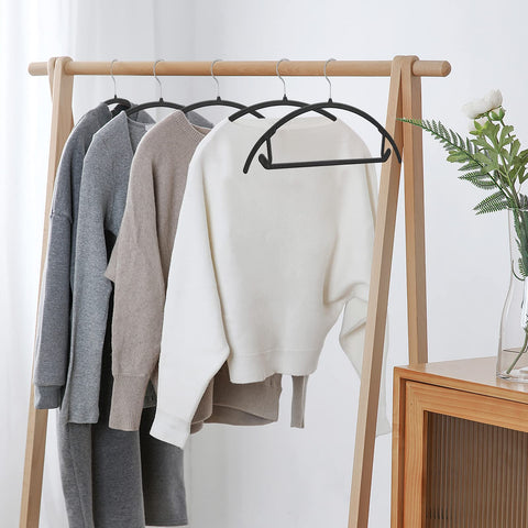 TIMMY sleek hangers save closet space while maintaining style.
