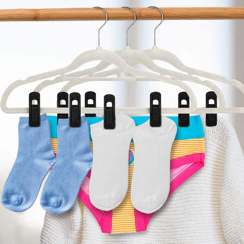 Tinfol closet organization with velvet clips keeps velvet hangers tidy.