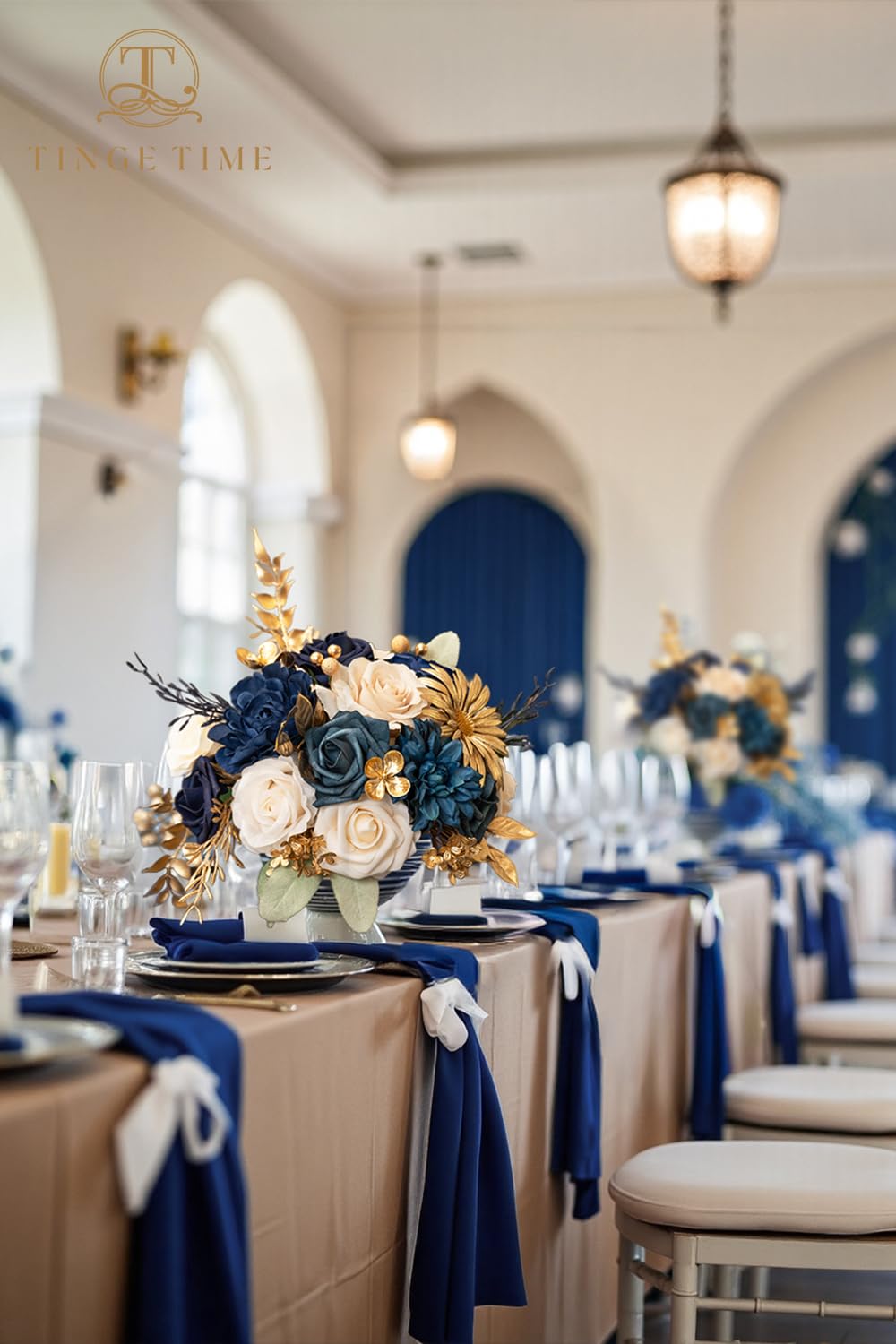 TINGE TIME navy blue ranunculus accents add lush texture to centerpieces.