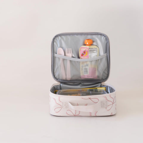 Tiny Twinkle lunch box interior wipe-clean surface ready for quick cleanup.