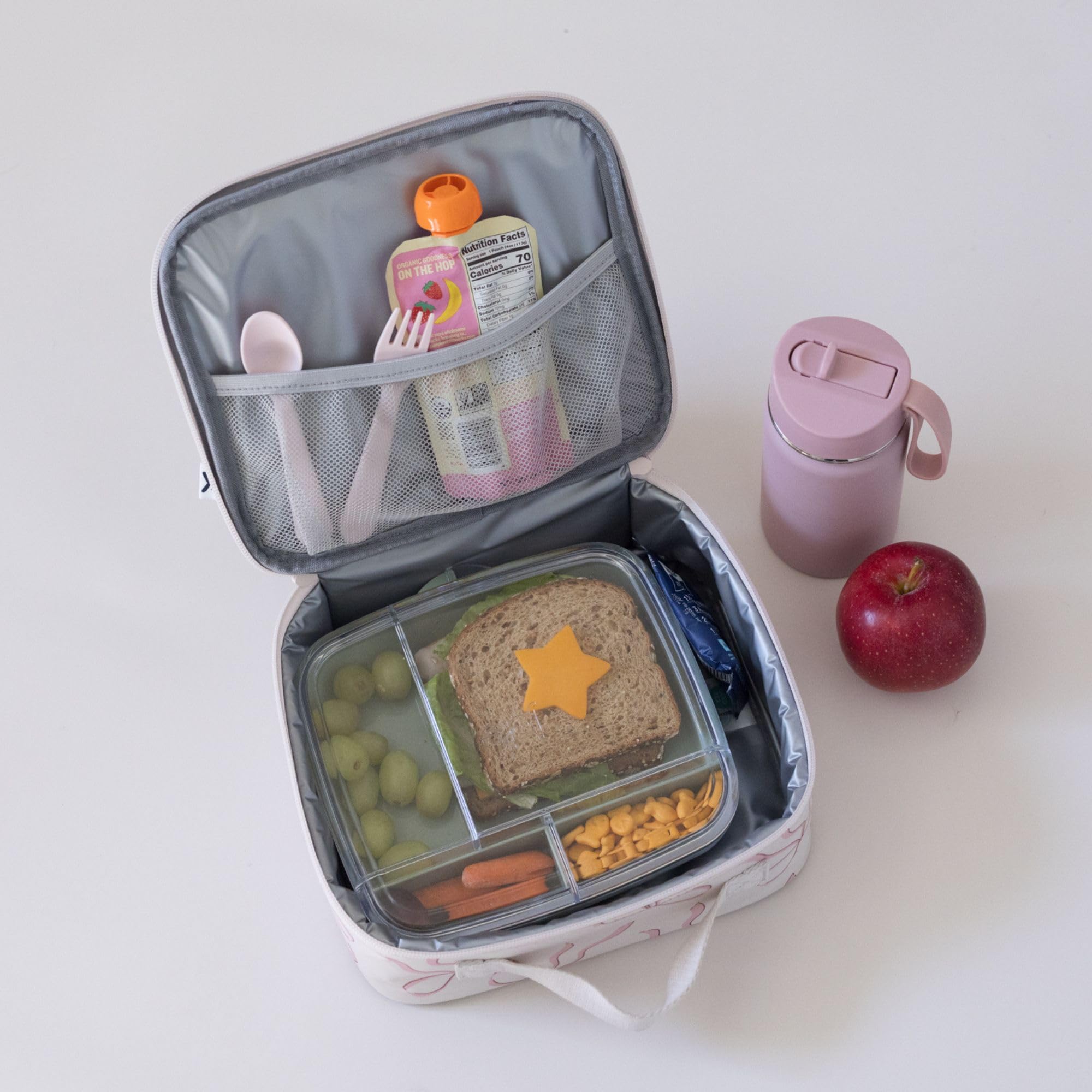 Tiny Twinkle lunch box waterproof exterior ready for spills during travel.