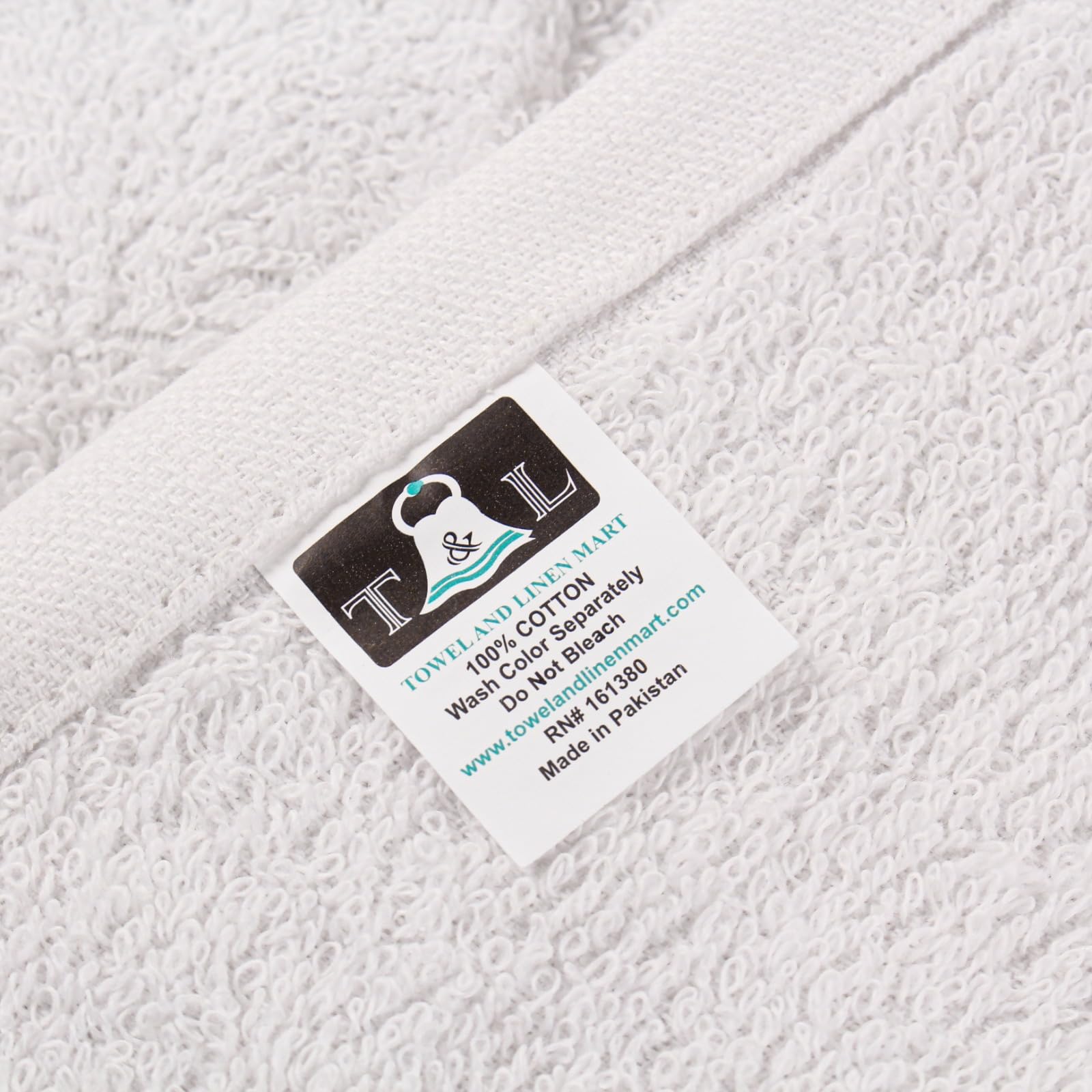 T & L Towel and Linen Mart machine washable white towels.