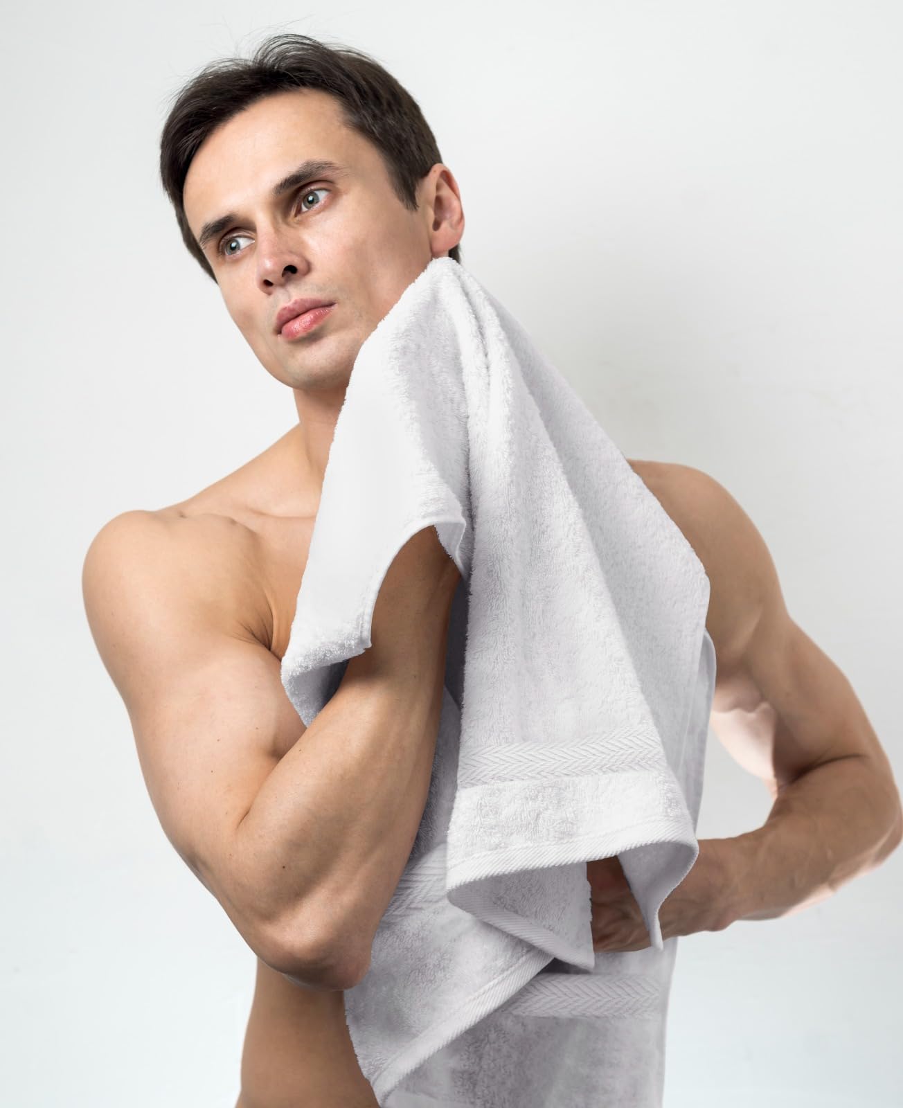 T & L Towel and Linen Mart soft-touch white bath towels.