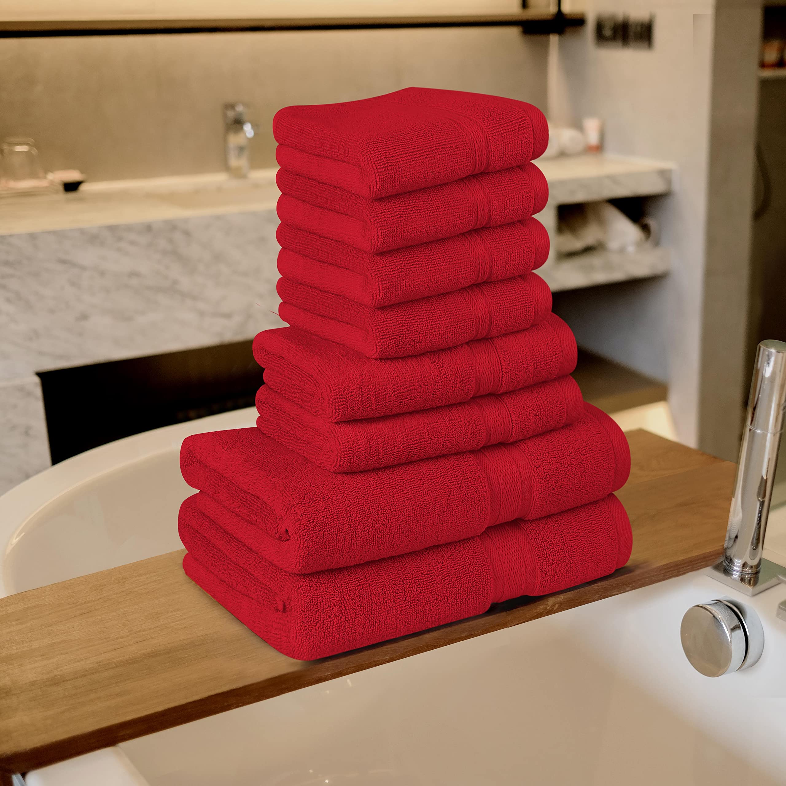 T&L burgundy towel set in a cozy bathroom scene, inviting daily pampering.