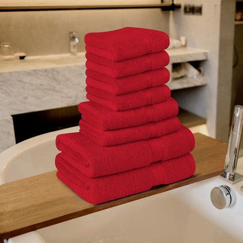 T&L burgundy towel set in a cozy bathroom scene, inviting daily pampering.