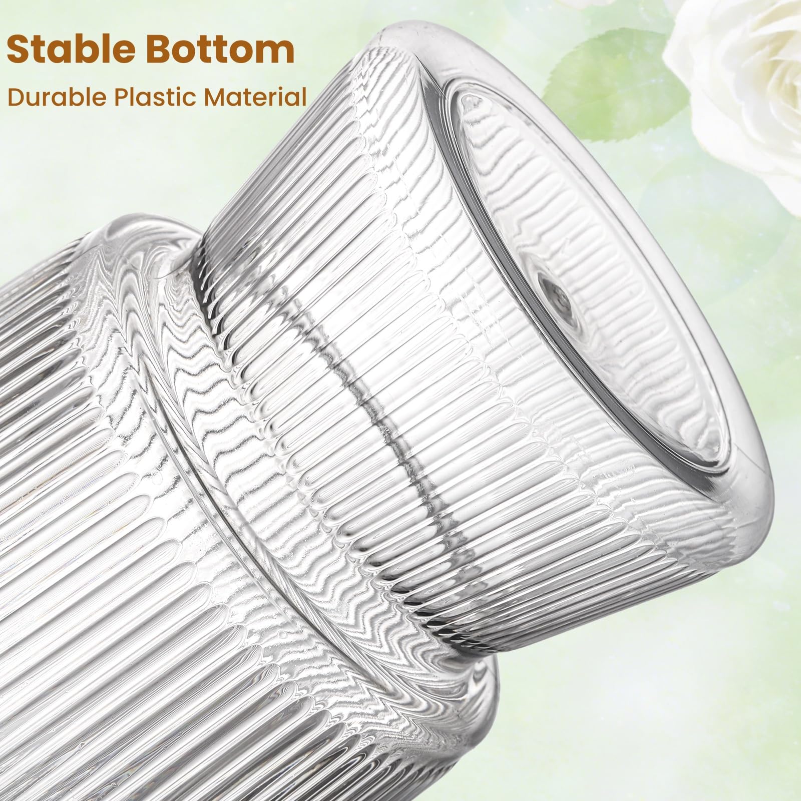 Tlence wide opening vase makes filling blooms easy and dramatic.