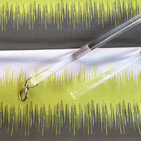 TOOFN drapery pull side view highlighting slim invisible acrylic design.