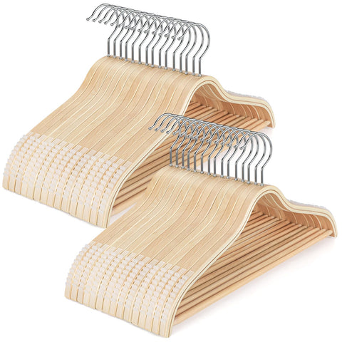 TOPIA HANGER sleek wooden hanger with non-slip shoulders keeps dresses secure.