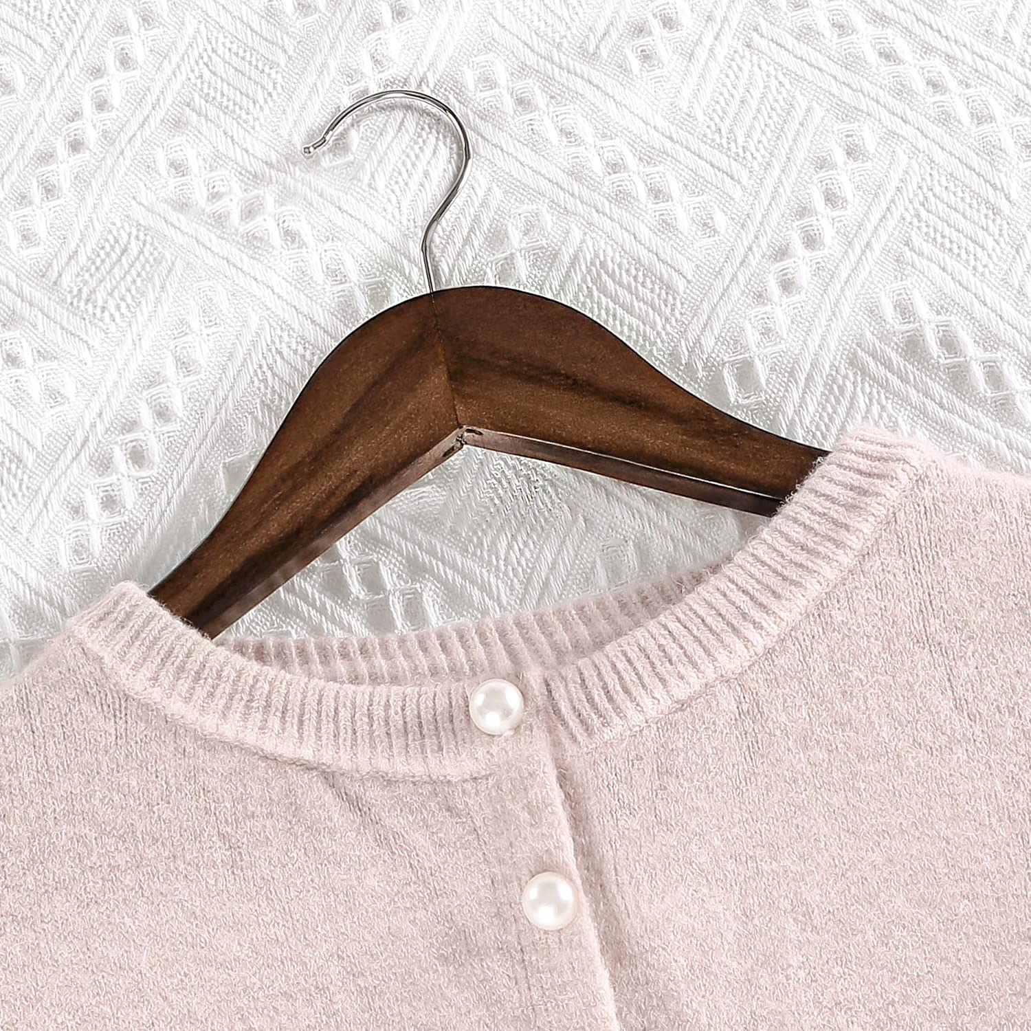 TOPIA HANGER smooth, finished surface protects fabrics from snagging.