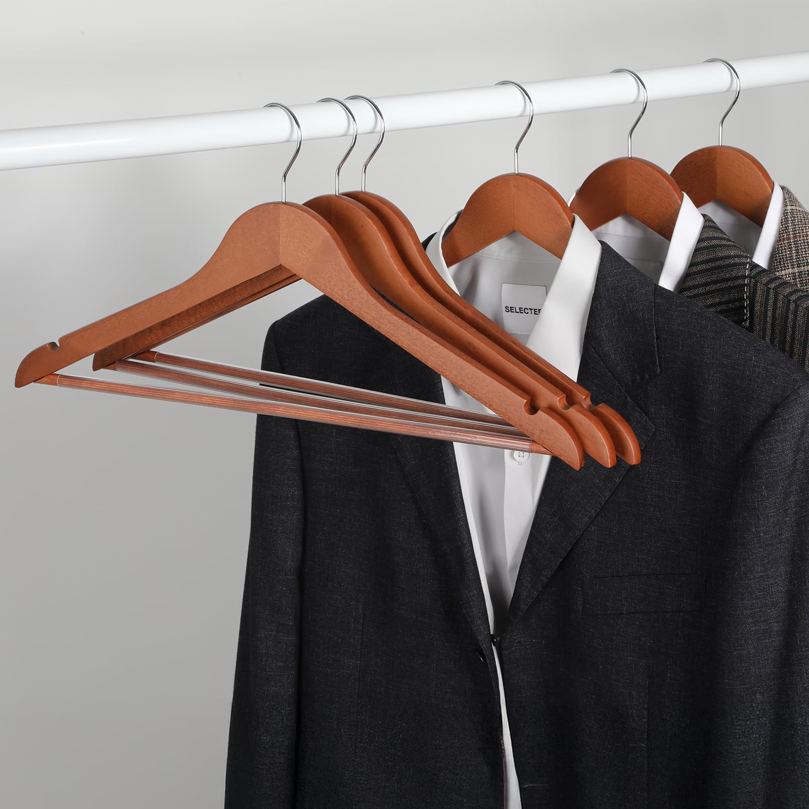 TOPIA HANGER smooth matte walnut finish protects fabrics and reduces snags