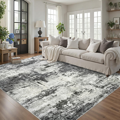 Tosuoka 8x10 abstract washable rug in living room, soft underfoot and easy to clean.